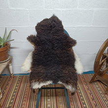 Load image into Gallery viewer, Black and White Soay Cross Sheepskin Rug
