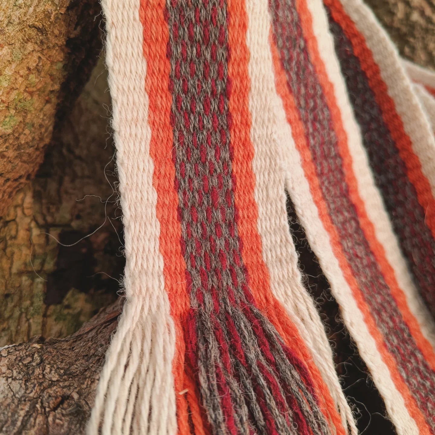 Hand woven wool band